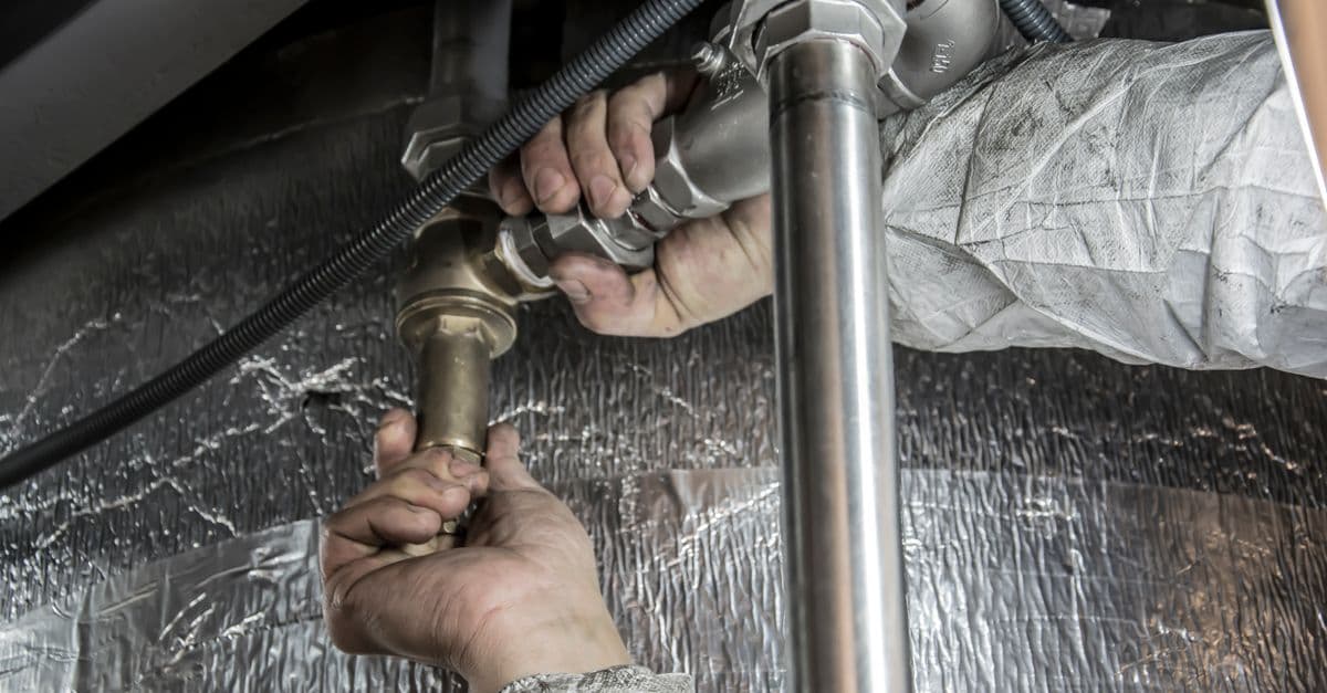 Plumbers at work